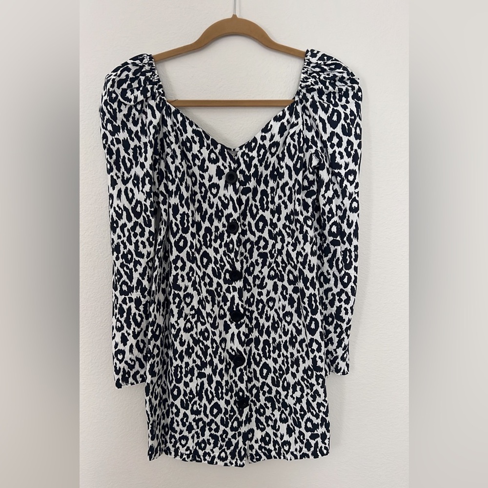 Animal print dress with puff shoulders